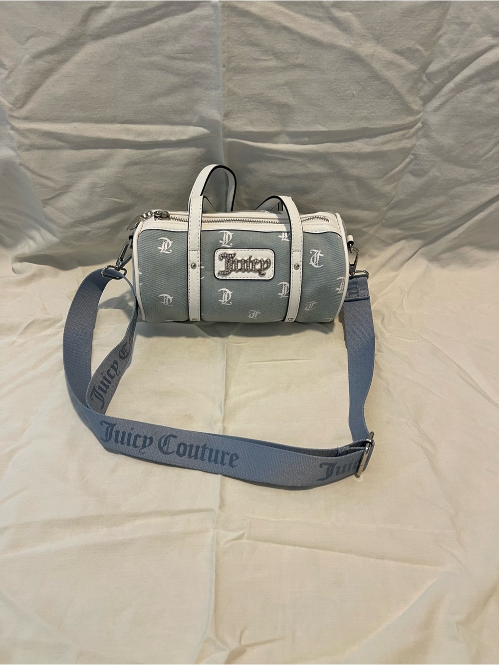 Juicy Couture Light Gray Barrel Duffel with White Trim and Navy Strap - Picture 1 of 9